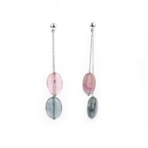 A pair of pink and green tourmaline drop earrings, the white gold post suspending a pink and gold