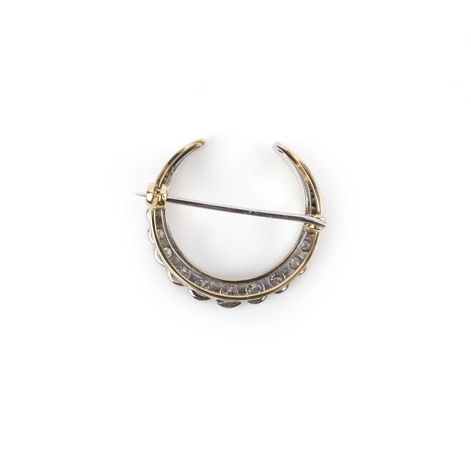 A diamond brooch, designed as a crescent moon, set with a line of graduated brilliant-cut - Image 2 of 2