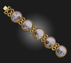 A gold and enamel plaque bracelet, each oval plaque depicting Swiss scenes within ropetwist