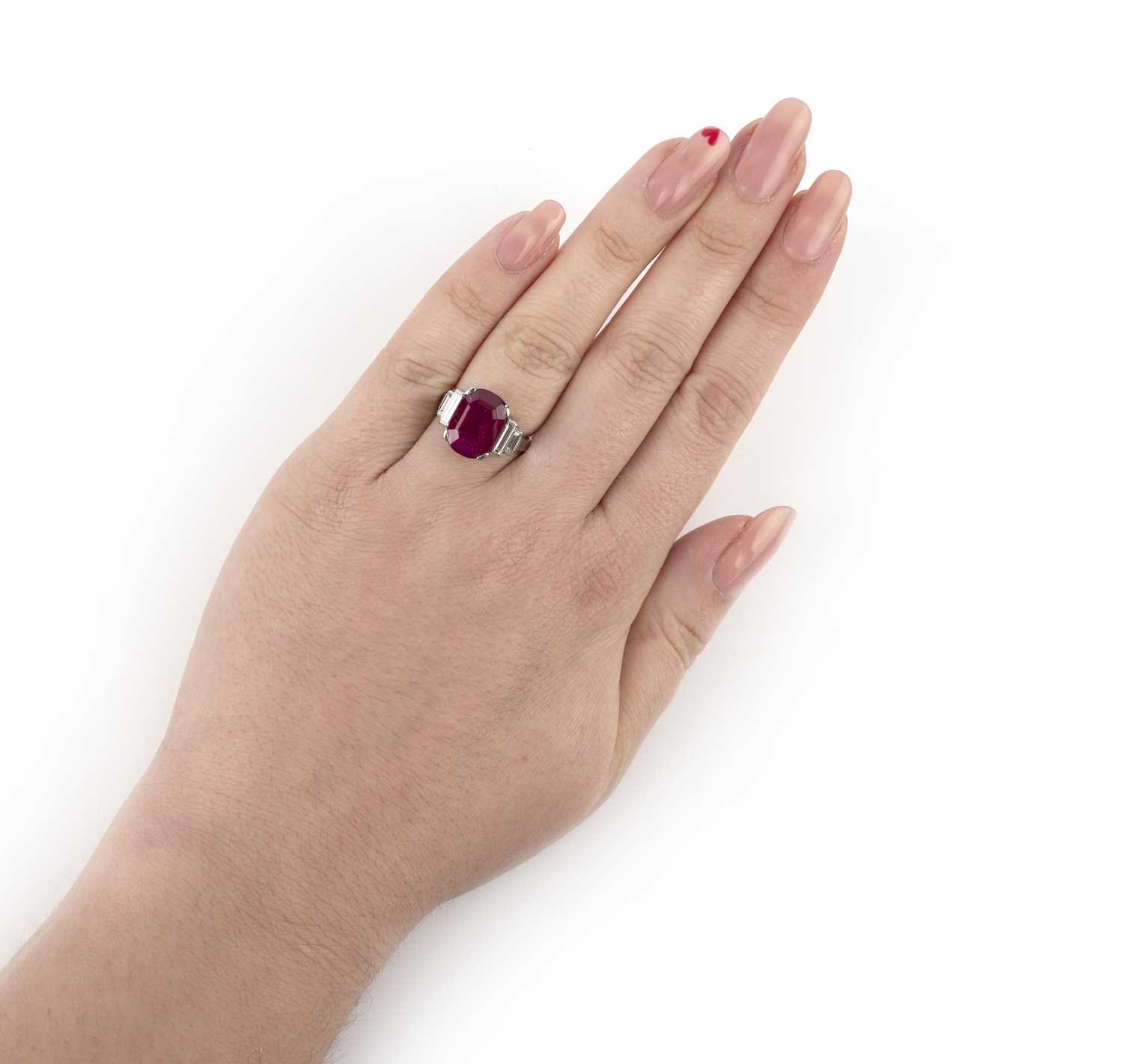 An impressive Art Deco ruby and diamond ring, 1920s, set with a cushion-shaped ruby weighing 5. - Image 2 of 7