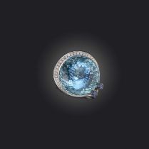 Pandora, an aquamarine and diamond dress ring, the large circular-cut aquamarine weighing