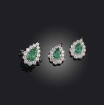 A pair of emerald and diamond drops and ring, each set with a pear-shaped emerald within a border of