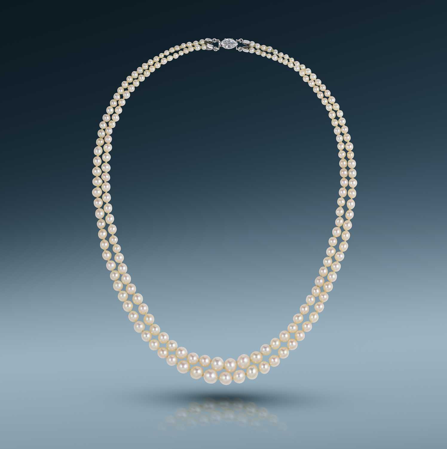 Boucheron, a fine and rare natural pearl and diamond necklace, first half 20th century, composed