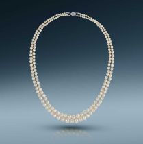 Boucheron, a fine and rare natural pearl and diamond necklace, first half 20th century, composed