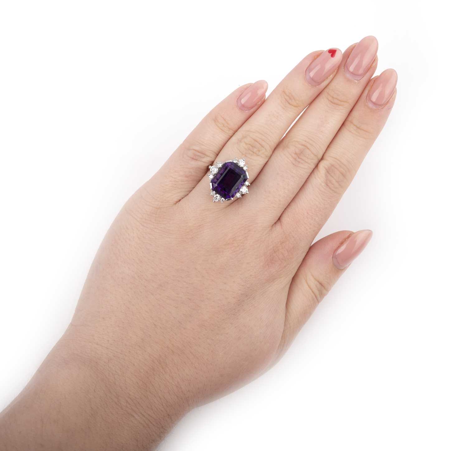 An amethyst and diamond cluster ring, the step-cut amethyst set within quatrefoil border of - Image 2 of 2