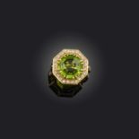 A paste and diamond cluster ring, of octagonal form, centring on a green paste within a surround