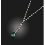 J.E. Caldwell, an Art Deco emerald and diamond necklace, 1920s, the pendant of tassel design, set