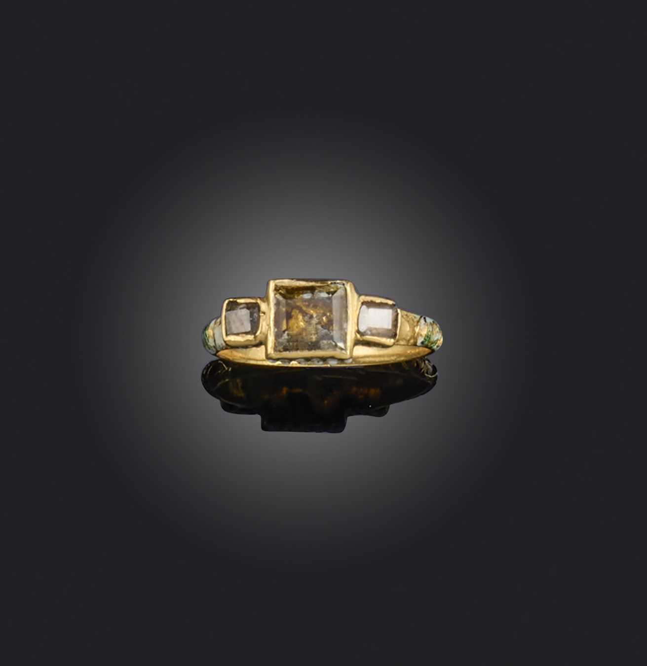 A rock crystal and enamel ring, late 17th century, set with three table-cut rock crystals, within