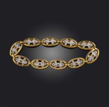 A ruby and diamond bracelet, early 20th century, composed of navette-shaped links centring on