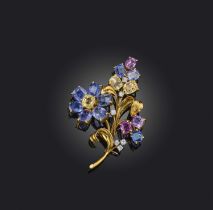 A sapphire and diamond brooch, mid 20th century, designed as a flower, set with multicoloured