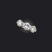 A diamond three stone ring, set with graduated round brilliant-cut diamonds weighing approximately