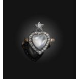 A moonstone and diamond ring, designed as a heart surmounted by a star, set with a polished heart-