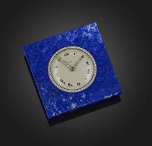 Cartier, an Art Deco lapis lazuli, enamel and diamond desk timepiece, 1920s, the silvered