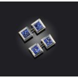 A pair of sapphire cufflinks, of square form, each set with calibré-cut sapphires within a