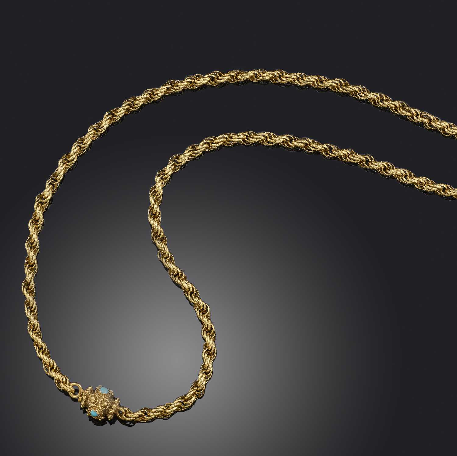 A late Georgian gold and turquoise longchain, 1830s, of twisted design, composed of gold hoop