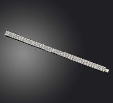 Henri Lavabre, a fine Art Deco diamond bracelet, 1920s, designed as an articulated ribbon, pavé-