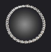 A diamond and gold fancy-link collar necklace, set with polished and twisted links, the front