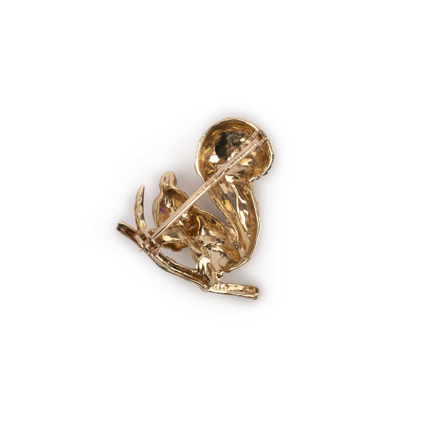 Boucheron, a gold and ruby brooch, mid 20th century, designed as a squirrel on a branch holding a - Image 2 of 2