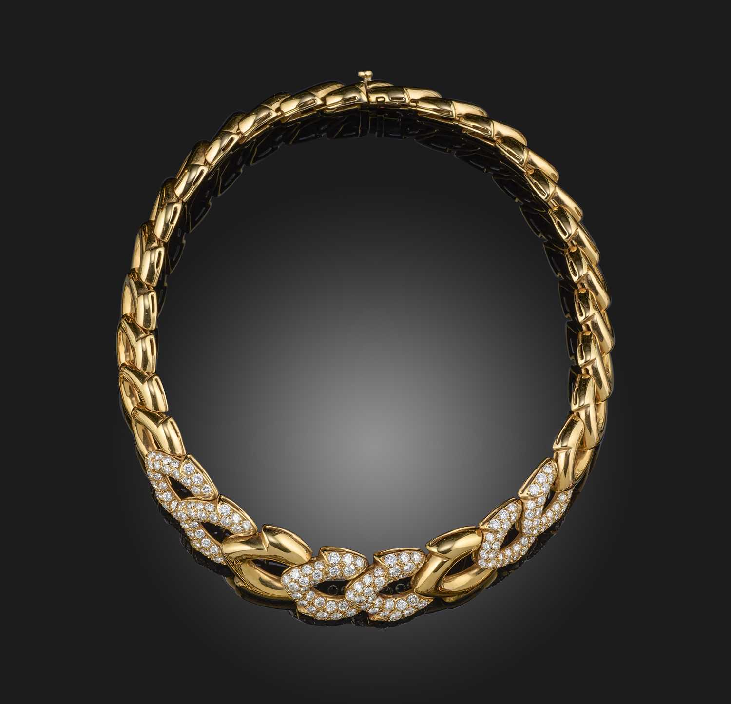 A diamond-set gold collar necklace, six of the graduated fancy links pave-set with graduated