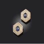 Vourakis, a pair of sapphire and diamond ear clips, each of hexagonal outline, set with cabochon