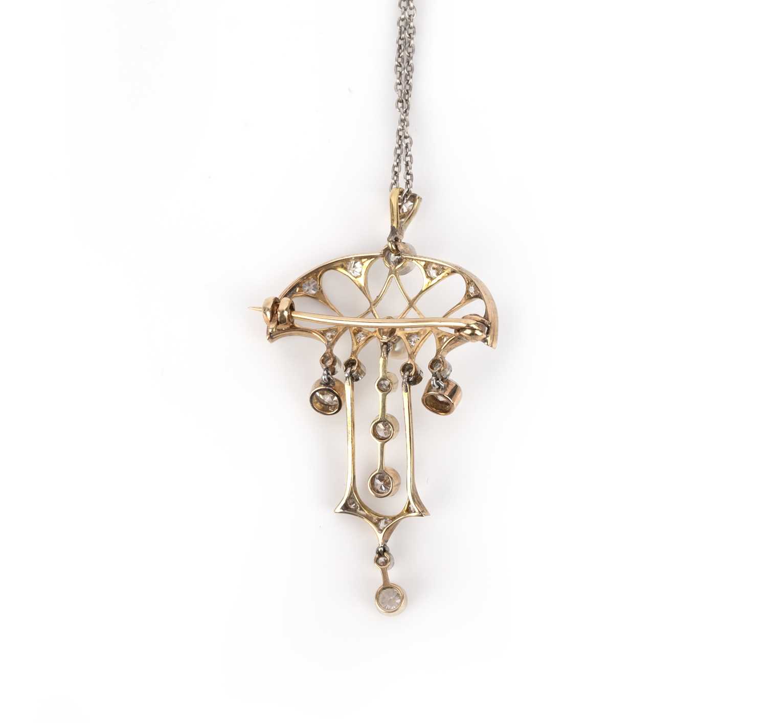 An Art Nouveau diamond pendant/brooch, early 20th century, of abstract foliate design suspending - Image 2 of 2