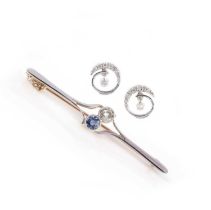 A sapphire and diamond brooch, early 20th century, and pair of diamond earrings, the brooch of bar