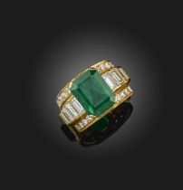 An emerald and diamond dress ring, the step-cut emerald measuring 12.3 x 9.6 x 6mm and weighing