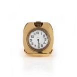 Tiffany & Co. and Octava Watch co., a gold travel clock, mid 20th century, the circular dial with