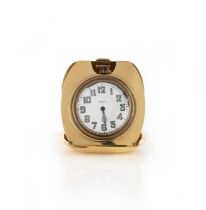 Tiffany & Co. and Octava Watch co., a gold travel clock, mid 20th century, the circular dial with
