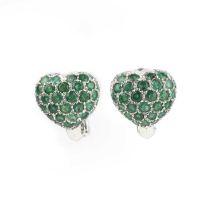 A pair of emerald earrings, each designed as a heart, pavé-set with circular-cut emeralds, mounted