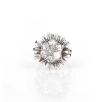 Φ Φ John Donald, a diamond ring, circa 1965, centring on a star motif set with six kite-shaped