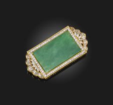 A jadeite and diamond brooch, set with a rectangular plaque of jadeite measuring approximately 3.6 x
