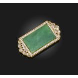 A jadeite and diamond brooch, set with a rectangular plaque of jadeite measuring approximately 3.6 x