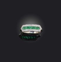 An emerald and diamond half hoop ring, set with French-cut emeralds within a surround of diamonds in
