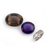 Two loose stones and a ring, comprising: a loose oval amethyst weighing approximately 33.00