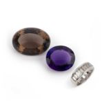 Two loose stones and a ring, comprising: a loose oval amethyst weighing approximately 33.00