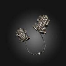 A pair of diamond and emerald brooches, designed as frogs, set with circular-cut diamonds totaling