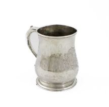 A George II silver mug, by Thomas Whipham, London 1744, baluster form, scroll handle, with an