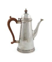 A silver coffee pot, by William Comyns & Sons Ltd, London 1962, tapering circular form, wooden