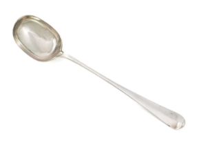 A George III silver serving spoon, possibly stamped CW over TD, circa 1770, engraved shield to the