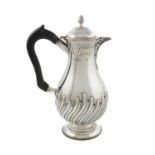 A late-Victorian silver hot water pot, by William Hutton & Sons Ltd, London 1894, baluster form,