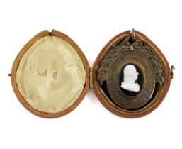 A Pitt Club medal, by William Tassie, circa 1806 shaped oval form surmounted by a wreath with a ring