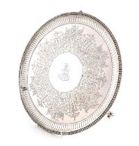 A Victorian silver salver, by Henry Holland, London 1878, circular form, engraved decoration,