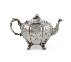 λ A Victorian silver teapot, by Edward, John & William Barnard, London 1849, lobed circular form,