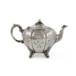 λ A Victorian silver teapot, by Edward, John & William Barnard, London 1849, lobed circular form,