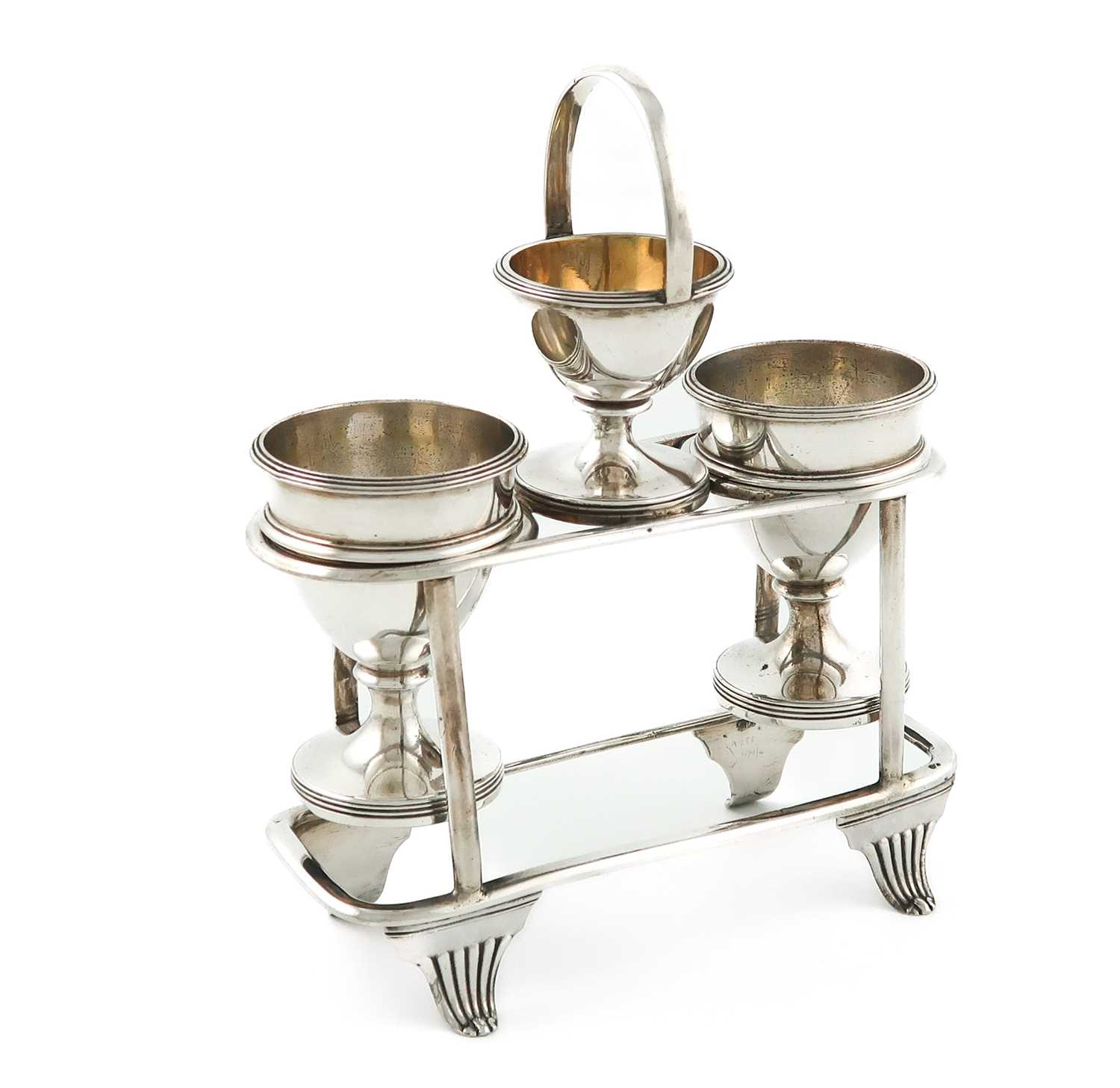 A George III silver two-egg cup cruet, by John Emes, London 1805, rectangular form, wire-work frame,