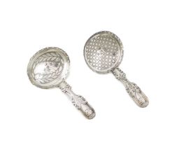 Two George III silver caddy spoons, by John Bettridge, Birmingham 1817, one with an oval bowl and