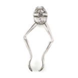 A pair of novelty silver frog sugar tongs, unmarked, the arms modelled as the frog's legs, spring-