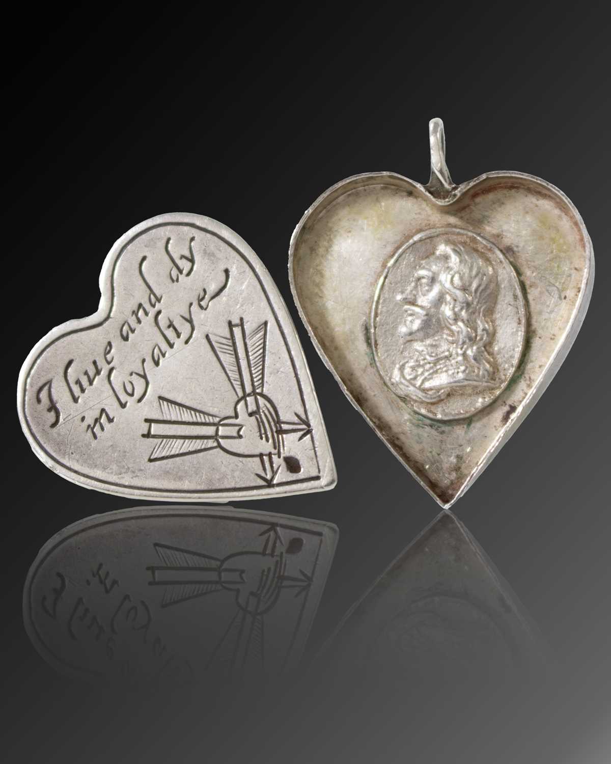 A Charles I silver royalist locket, unmarked circa 1648, heart shape form, ring attachment, the