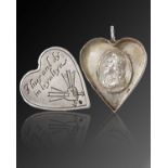 A Charles I silver royalist locket, unmarked circa 1648, heart shape form, ring attachment, the